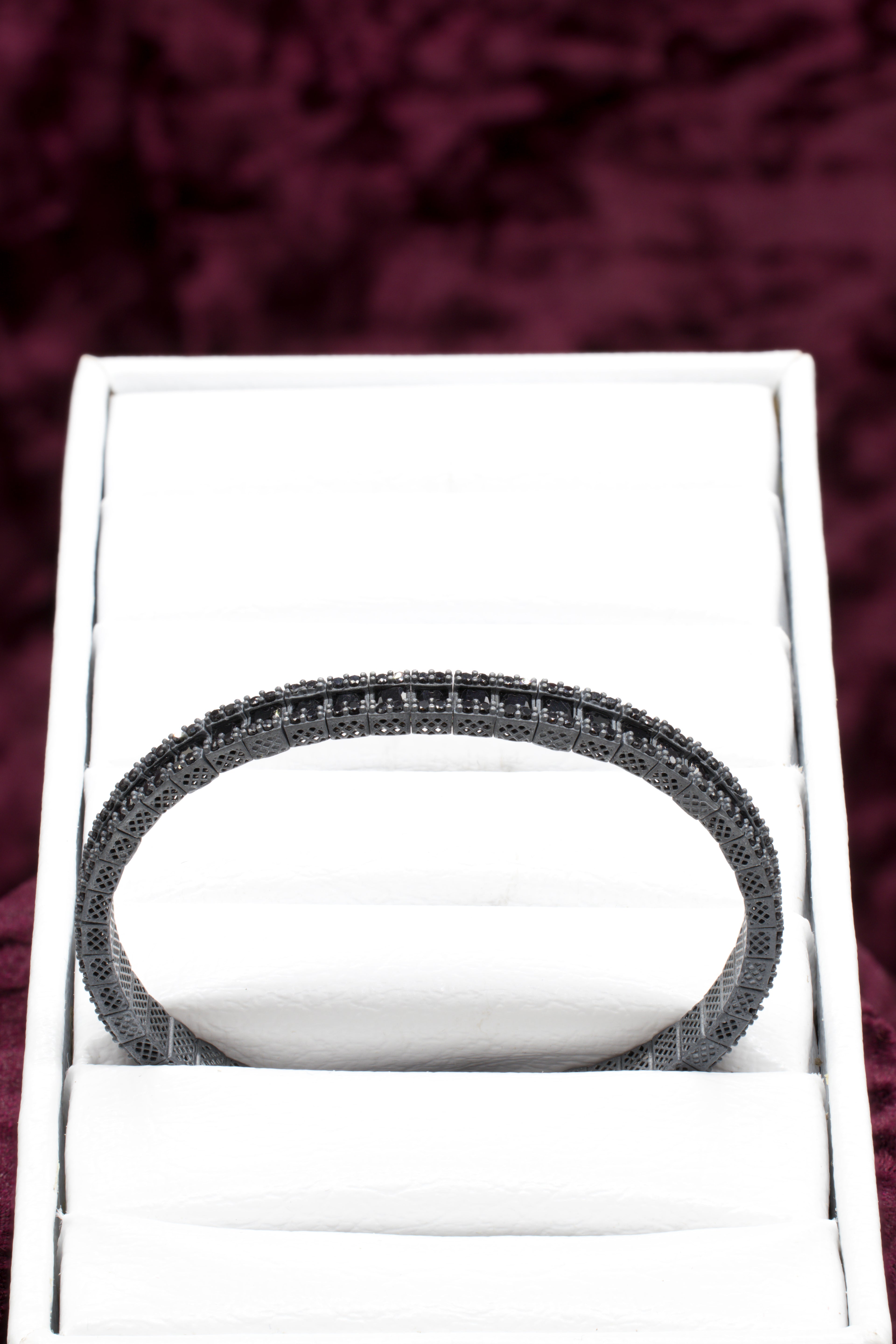 Pulsera tenis con micro circones negros y plata quemada